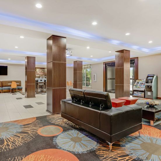 Lobby view of SureStay Plus Hotel by Best Western Owasso Tulsa North