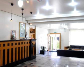 Hotel Cidade - Passos - Front desk
