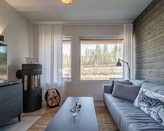 Tunturinlaita D1 by Aavalevi Holidays, Ski-in Ski-out - Levi - Wohnzimmer