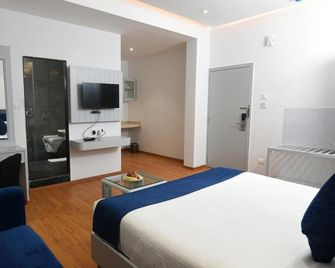 We Hotel Chinchwad - Pimpri - Chinchwad - Schlafzimmer