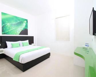 Evan Hotel - Non Smoking - Jambi - Schlafzimmer