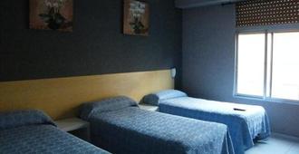 考羅納旅館 - 薩拉戈薩 - 臥室