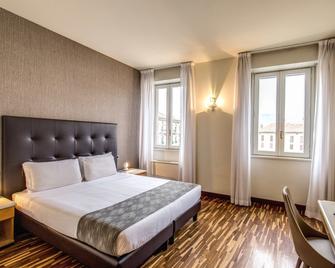 Albergo Firenze - קומו - חדר שינה