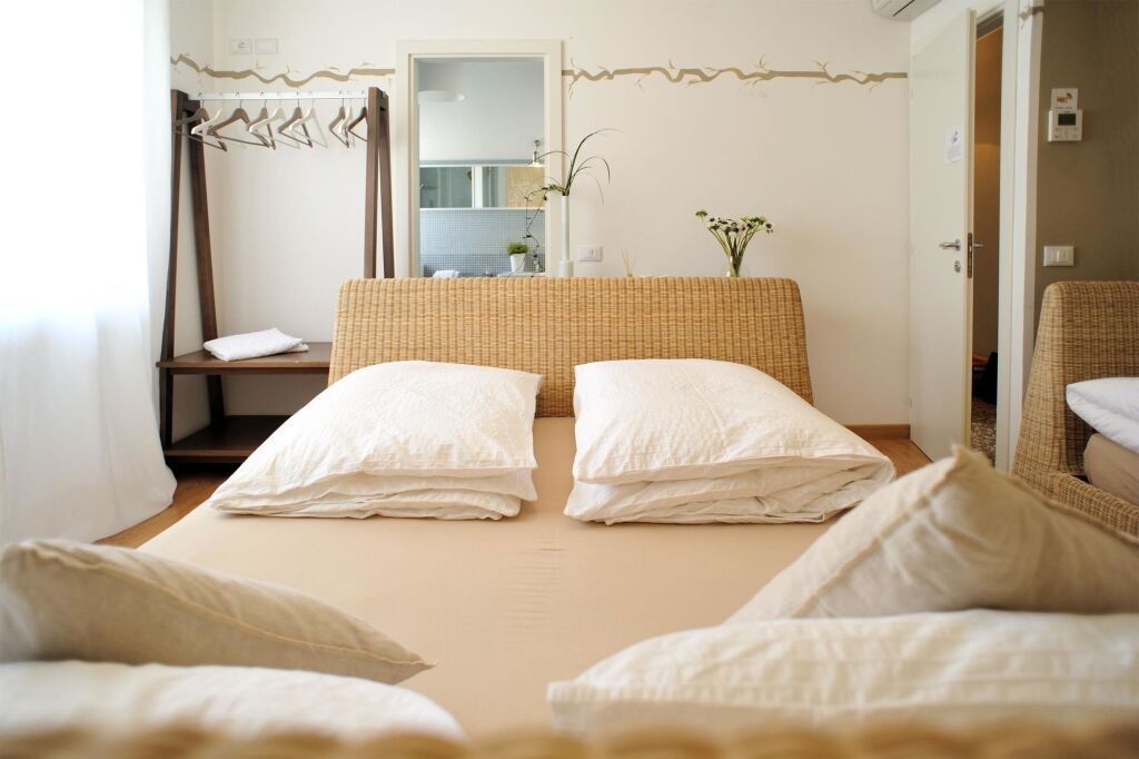 Stop & Sleep Udine - אודינה - חדר שינה