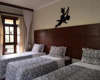Arusha Planet Lodge - Arusha - Schlafzimmer