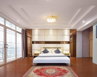 Yitong Chenglin Hotel - Lingshui - Schlafzimmer
