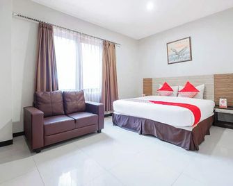 Hotel O Marina Andalas - Makassar - Bedroom