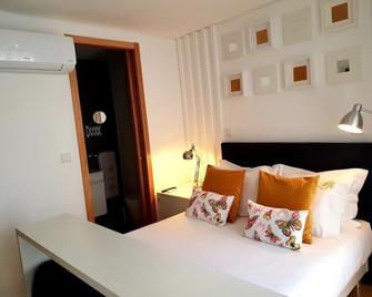 Bellu Suites - Guimarães - Habitación