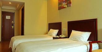 Greentree Inn Luoyang Peony Square Business Hotel - Luoyang - Bedroom