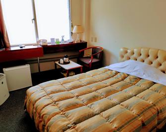 Business Hotel Tenmonkan - Кагошіма - Спальня