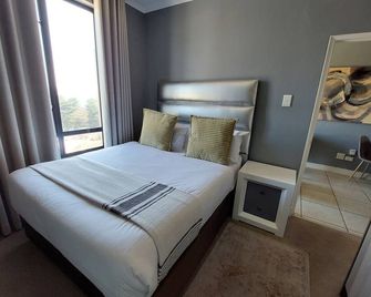 Zwelakho Luxury furnished apartments - Sandton - Bedroom