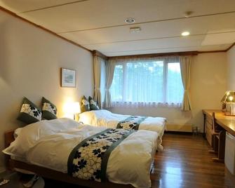 Auberge Chimikepp Hotel - Tsubetsu - Bedroom
