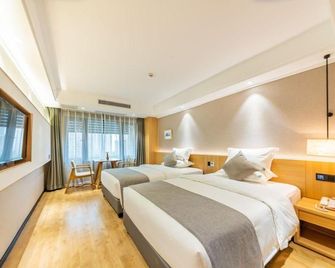 Youyi Homestay (Chongqing Aegean Shopping Park) - Chongqing - Bedroom