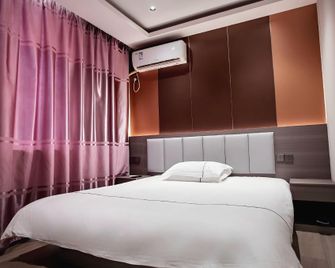 Liuheju Hotel (Jingchuan Park Branch) - Changzhou - Bedroom