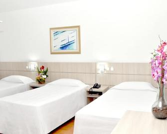 Caravelle Palace Hotel - קוריטיבה - חדר שינה