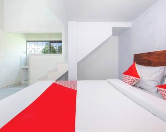 Hotel O Ibma Smart Syariah - Pasuruan - Slaapkamer
