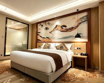Lianyungang Dong Yuan International Hotel - Lianyungang - Soveværelse