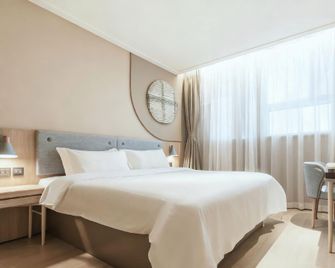 Home Inn Tianjin Yangliuqing Xinhua Avenue - Tianjin - Bedroom