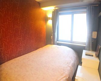 Tokyo Tourist Inn - Tokyo - Bedroom