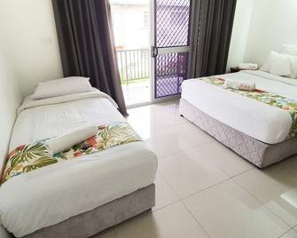 Island Apartments - Suva - Schlafzimmer