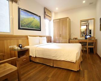 بلو هانوي هوتل - هانوي - غرفة نوم