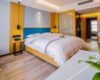Chunqiu International Hotel - Guangyuan - Bedroom