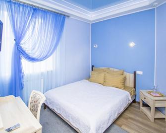 Guest House Gamma - Chanty-Mansijsk - Schlafzimmer
