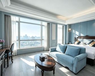 Zhoushan Huanyu Holiday Hotel - Zhoushan - Chambre
