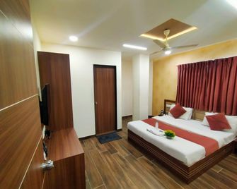 Hotel Shiv Shakti - Rajkot - Ložnice