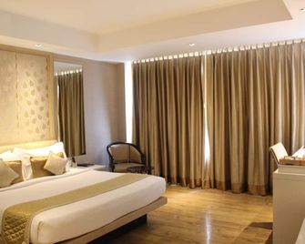 Hotel Swati - ניו דלהי - חדר שינה