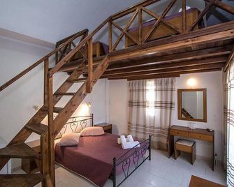 Petra Nera - Perissa - Habitación