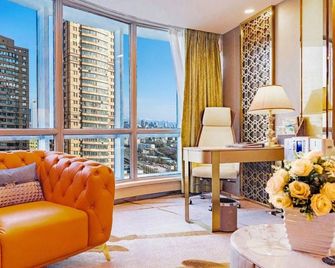 Mingyuan New Times Hotel - Ürümqi - Sovrum