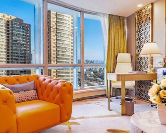 Mingyuan New Times Hotel - אורומצ'י - חדר שינה