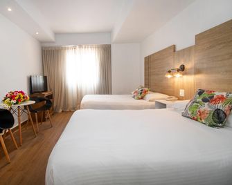 Hotel Faranda Express Soloy and Casino, a member of Radisson Individuals - פנמה סיטי - חדר שינה