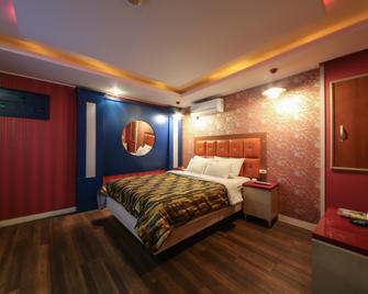 Gunsan Shall - Gunsan - Schlafzimmer