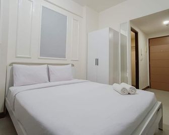 White And Cozy Studio At Vida View Makassar Apartment - Makassar - Schlafzimmer
