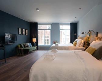 Six Boutique Hotel - Deluxe Quadruple Room - Haarlem - Camera da letto
