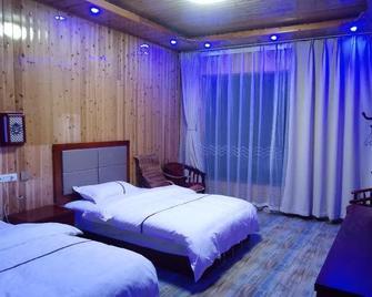 Hongtu Qicai Renjia Hostel - Côn Minh - Phòng ngủ