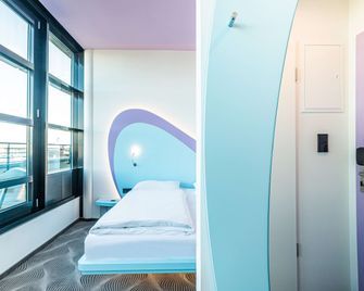 برايز باي راديسون، روستوك سيتي - روستوك - غرفة نوم