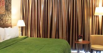Jodipati Hotel - Bengkulu City - Bedroom