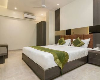 Hotel Oyster Suite Andheri West - Μουμπάι - Κρεβατοκάμαρα