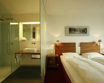 Hotel Knoblauch - פרידריכסהאפן - חדר שינה