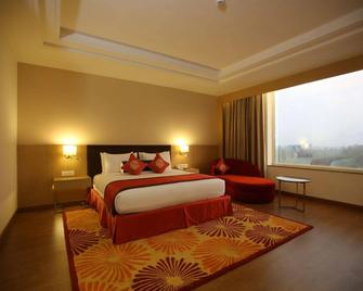 Country Inn And Suites By Carlson Meerut - Meerut - Bedroom