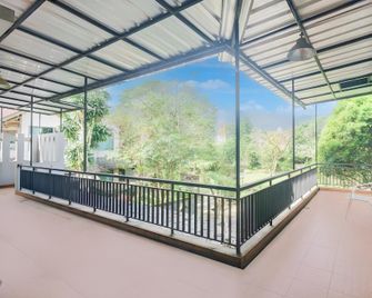 Capital O 94594 Hotel Rudian - Puncak - Balcone