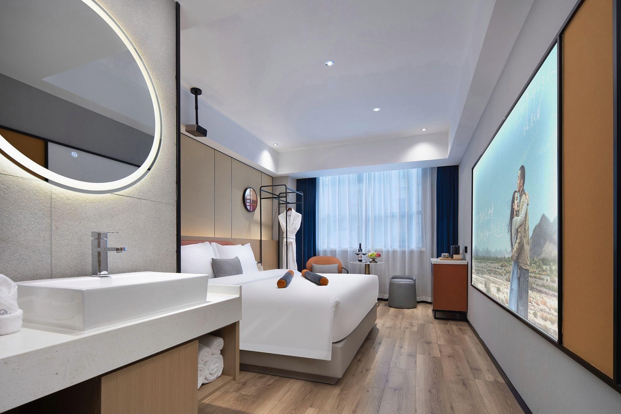 Do A Land V Hotel (Changsha Wuyi Square Helong Stadium Branch) - צ'נגשה - חדר שינה
