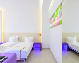Hotel Christina Plus - Bukarest - Schlafzimmer