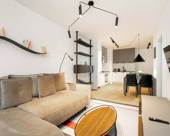 Prestiżowe Apartamenty w Poznaniu z Sypialnią i Parkingiem by Noclegi Renters - Poznan - Living room