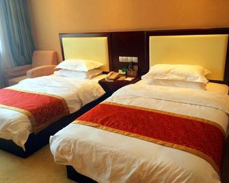 Jinlai International Hotel - Jingdezhen - Slaapkamer
