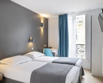 باريس ليجيندر - باريس - غرفة نوم