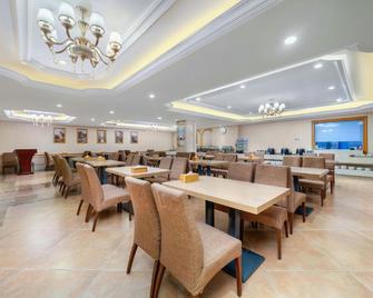 Vienna Hotel Tianjin West Station Changhong Park Metro Station - Tianjín - Restaurante